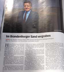 Foto mit Mähdern auf einer Innenseite des Spiegels heute Foto von einer Innenseite des aktuellen Spiegels ist zu sehen
