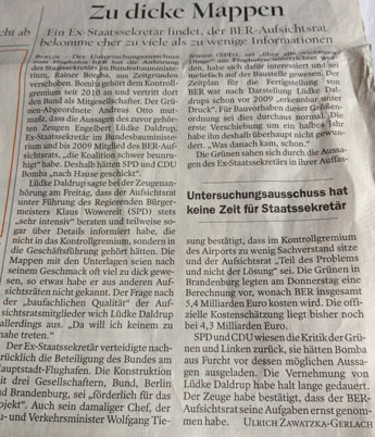 Zeitungsartikel ist zu sehen - Foto.