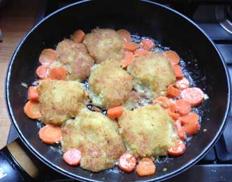 Foto von einer Pfanne mit Kartoffelkroketten