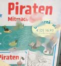 in einem Schaufenster gesehen! Foto: im Schaufenster eine Ankündigung mit dem Titel Piratenheft